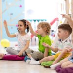 Children enjoying a group story and activity session